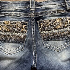 Signature Blue Jeans with Vintage Wash and Decorative Stitching